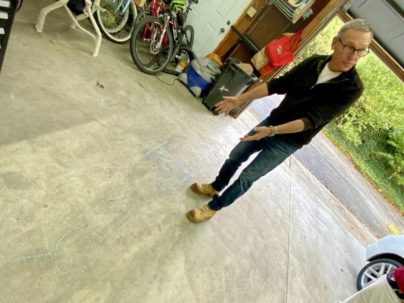 Before creating the body of the chairs, Allen Sangree drew their forms in chalk on his workshop floor.